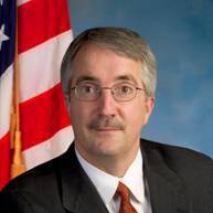 Dwight E. Adams